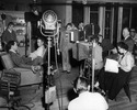 Rear Window (1954) - on set - On set photograph from ''Rear Window''. Cinematographer Robert Burks is stood in the middle with the stripped shirt.