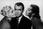 Vertigo (1958) - photograph - Publicity shot of Madeleine, Scottie, and Judy (Kim Novak and James Stewart) for ''Vertigo''.