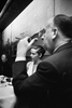Alfred Hitchcock and Vera Miles - Photograph of Alfred Hitchcock and Vera Miles, taken by photographer Elliott Erwitt. Hitchcock's wife Alma is in the background.